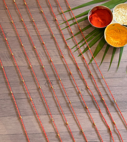 Moli with golden beads